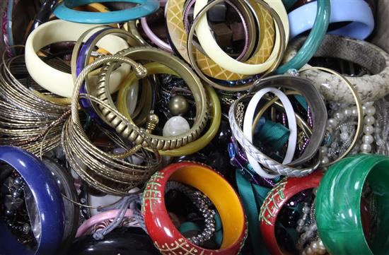 A quantity of mixed costume jewellery, including bangles, necklaces, etc.